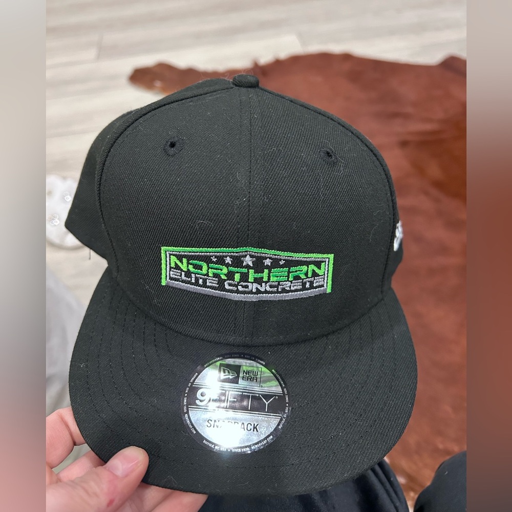 NWT 9 Fifty Men’s Black Snapback Cap with Green Logo